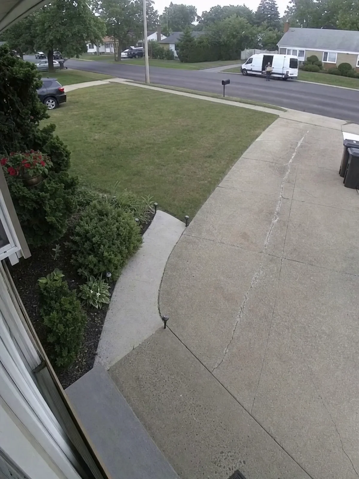 Surveillance Camera Capture: Morning Delivery Scene